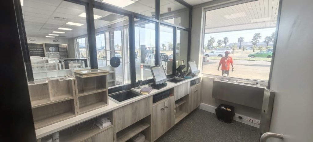 Front counter area with new electrical fittings, lighting, and power points installed by Faradays.