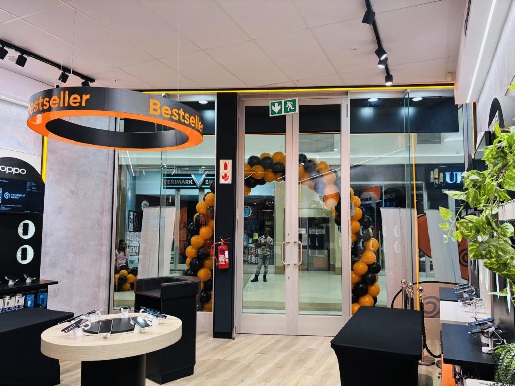 Cell C Galleria Mall retail interior showcasing lighting tracks, branded fixtures, and compliant electrical upgrades.