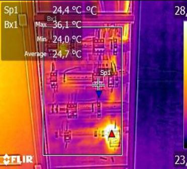 Infrared scan highlighting overheating electrical components inside a DB board.