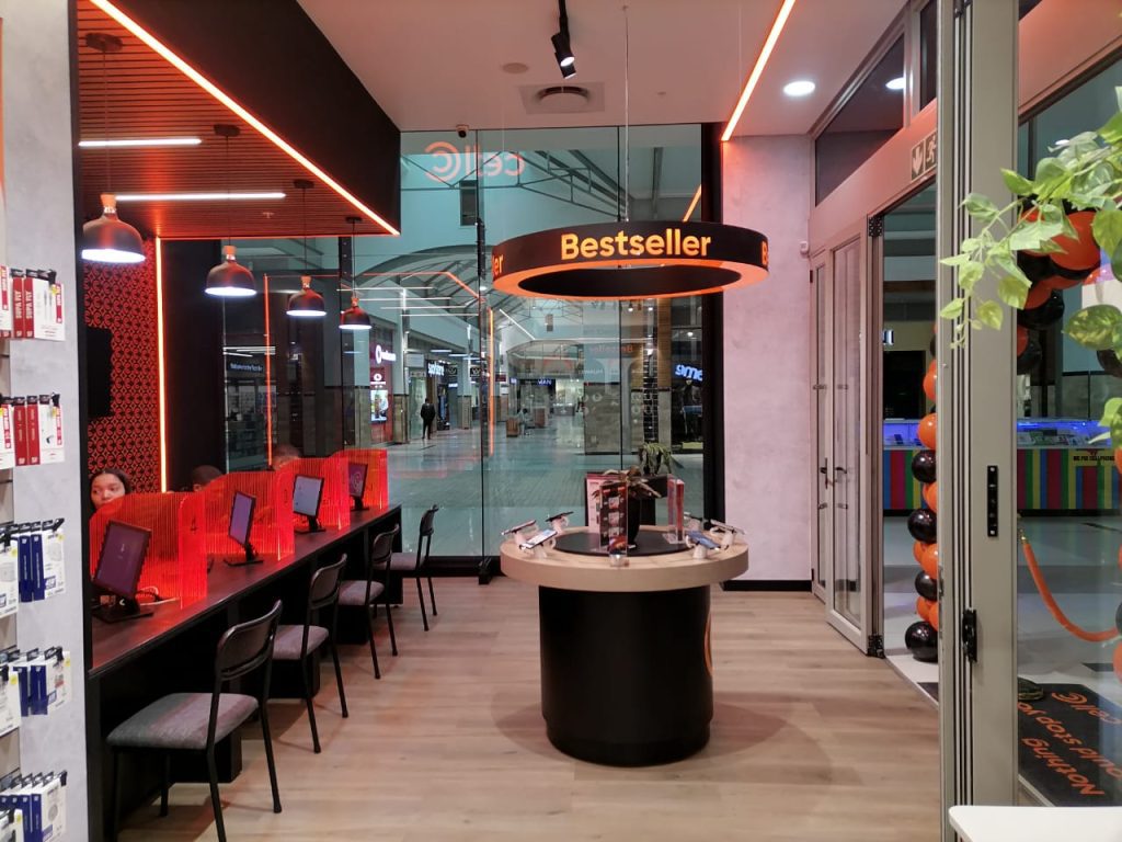 Cell C Zevenwacht Mall store seating and consultation area with modern LED lighting and power points.