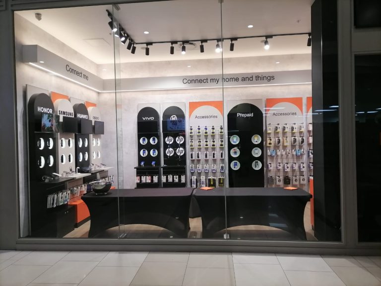 Cell C Zevenwacht Mall retail store interior showing compliant electrical installations, lighting, and display units.